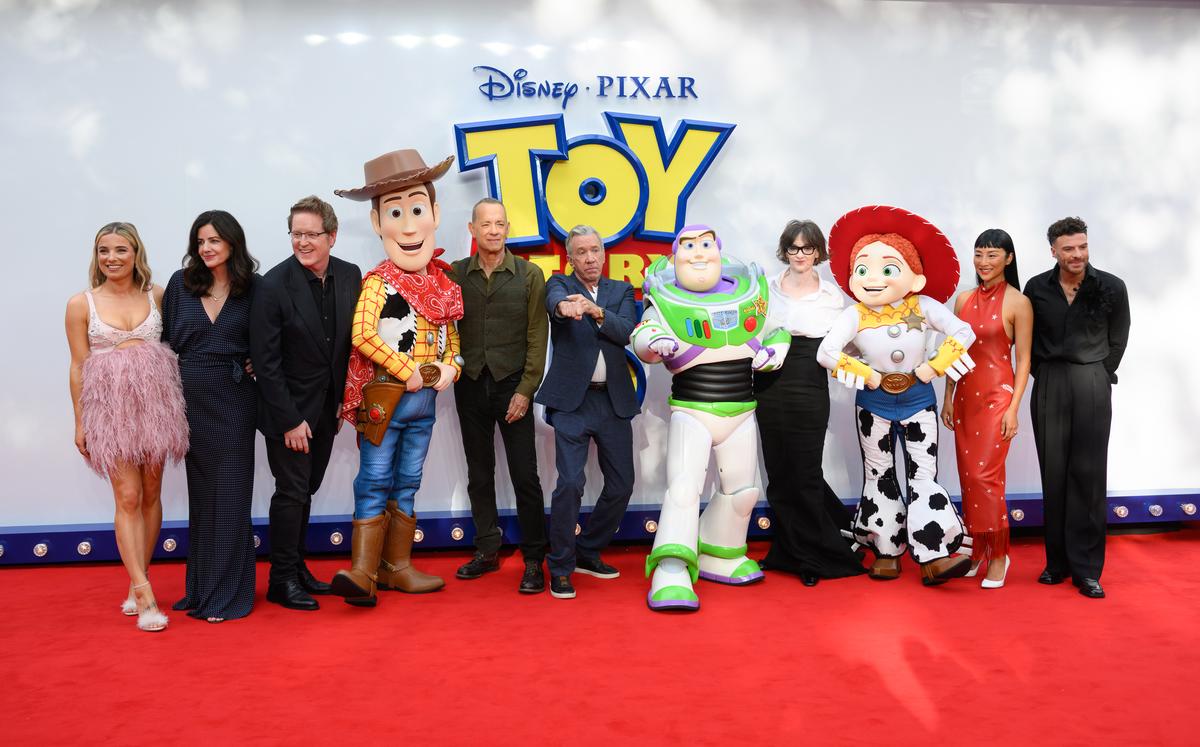 Sian Welby, Lindsey Collins, Andrew Stanton, ‘Woody’, Tom Hanks, Tim Allen, ‘Buzz Lightyear’, Joan Cusack, ‘Jessie’, Greta Lee and Jordan North attend the ‘Toy Story 5’ UK launch event on May 28, 2026, in LondonKarwai Tang/WireImage/Getty