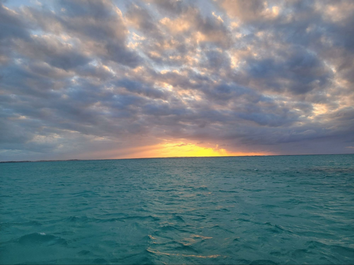 Sunset over Turks & Caicos. Photo credit: Lee Robbins