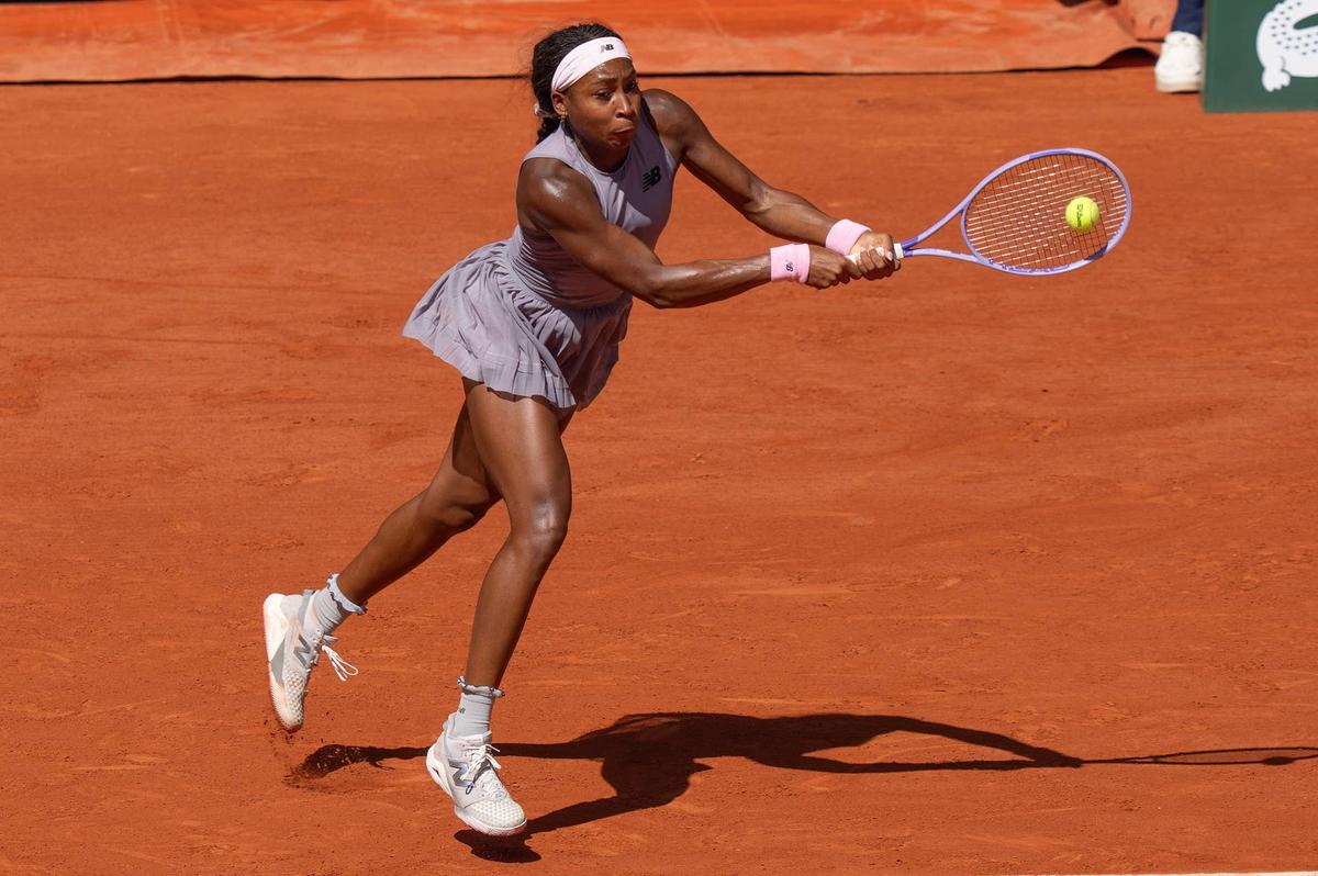  May 26, 2026; Paris, France; Coco Gauff of the United States returns a shot during her match against Taylor Townsend of the United States on day three at Stade Roland Garros. Mandatory Credit: Susan Mullane-Imagn Images 