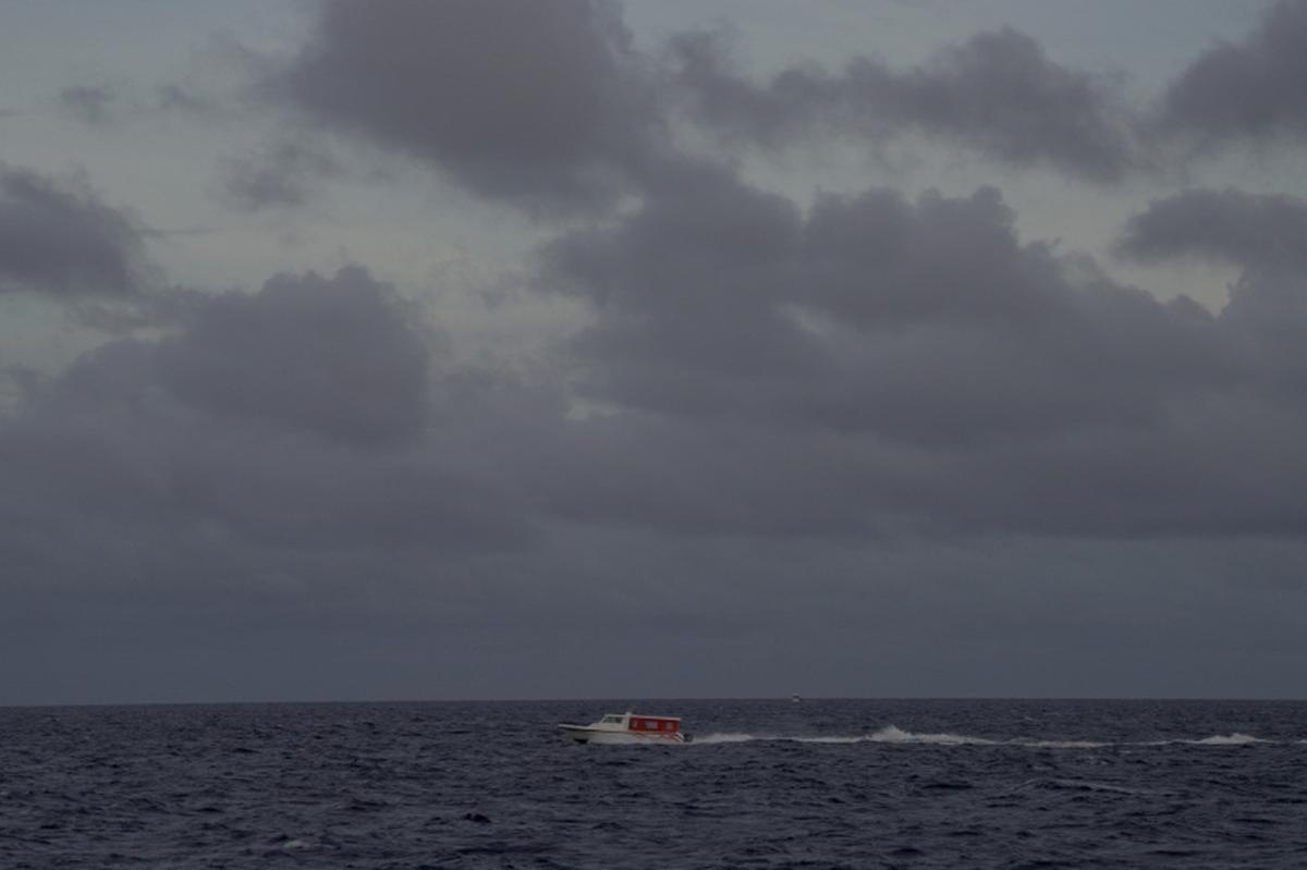 A speed boat moves in the waters of the Indian Ocean near Male, after a specialist team located the bodies of four missing Italian scuba divers who died in an accident in underwater caves, Maldives, May 18, 2026. REUTERS/Thilina Kaluthotage