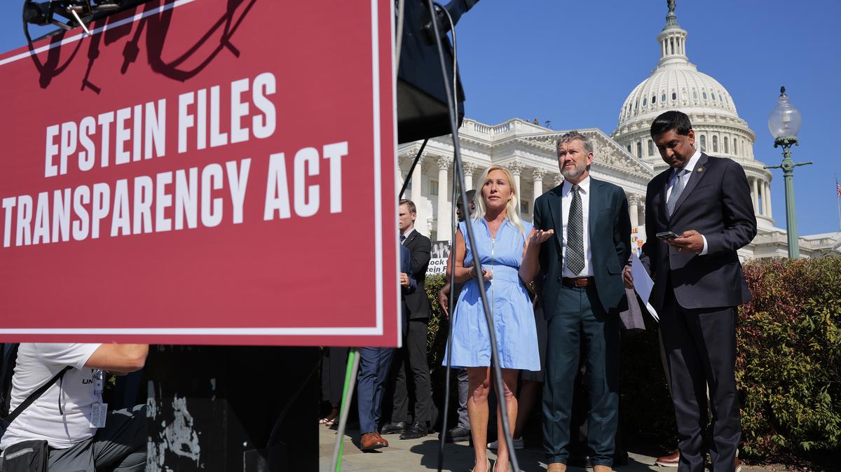 Left to right, U.S. Rep. Marjorie Taylor Greene (R-GA), Rep. Thomas Massie (R-KY) and Rep. Ro Khanna (D-CA) look on during a news conference with alleged victims of disgraced financier and sex trafficker Jeffrey Epstein outside the U.S. Capitol on Sept. 3, 2025, in Washington, D.C.