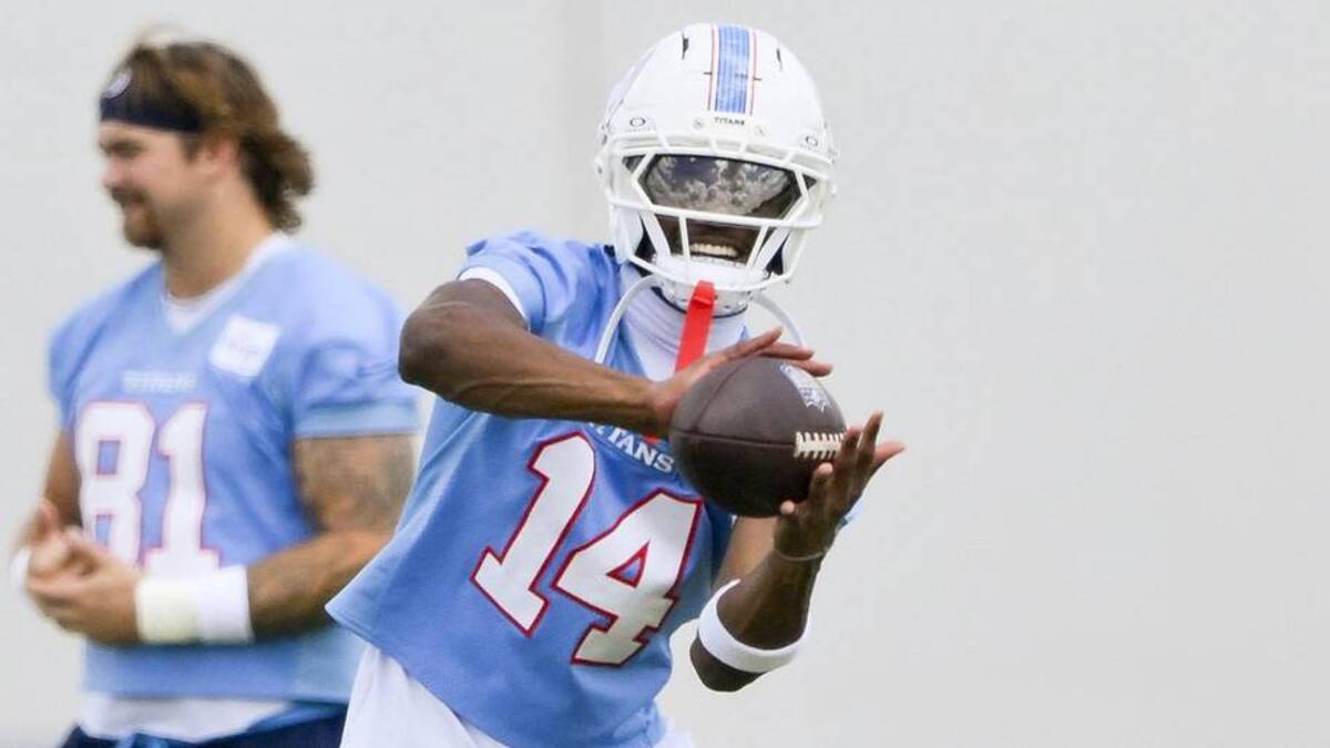  Tennessee Titans wide receiver Carnell Tate (14) makes a catch during day 1 of mini-camp at Vanderbilt Health Football Center. | Steve Roberts-Imagn Images 