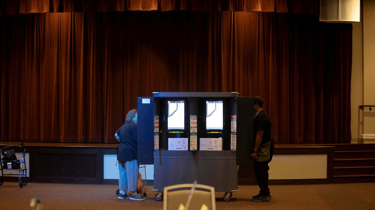 FILE PHOTO: People vote during the Georgia midterm primary election in Atlanta, Georgia, U.S. May 19, 2026.  REUTERS/Alyssa Pointer/File Photo
