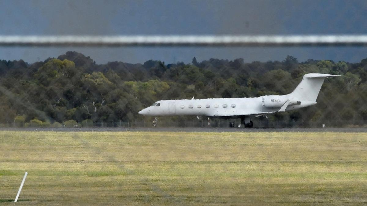 A charter plane carrying Australian travellers who spent time on the hantavirus-infected cruise ship MV Hondius arrives at RAAF Base Pearce in Bullsbrook, Australia, May 15, 2026. Aaron Bunch/AAP/via REUTERS