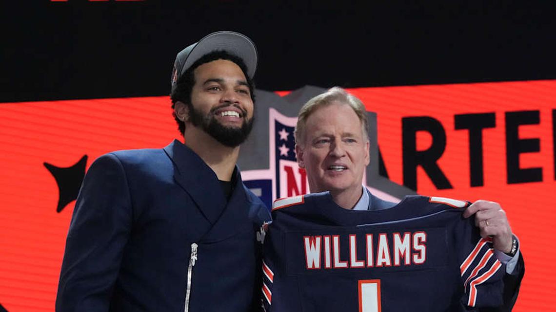 Apr 25, 2024; Detroit, MI, USA; Southern California Trojans quarterback Caleb Williams poses with NFL commissioner Roger Goodell after being selected by the Chicago Bears as the No. 1 pick in the first round of the 2024 NFL Draft at Campus Martius Park and Hart Plaza. Mandatory Credit: Kirby Lee-Imagn Images | Kirby Lee-Imagn Images 