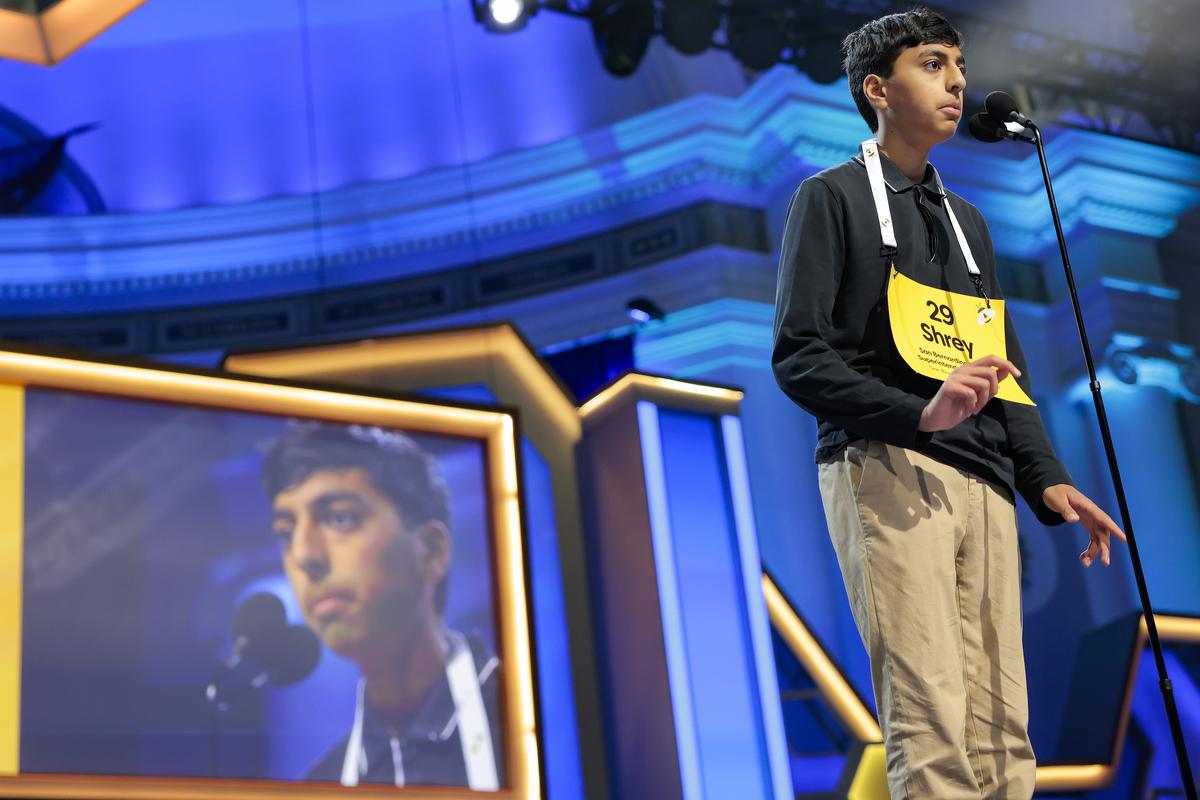  Shrey Parikh, 14, correctly spells a word in the final round of the Scripps National Spelling Bee, at Constitution Hall on Thursday night in Washington, D.C. (Photo by Heather Diehl/Getty Images) 