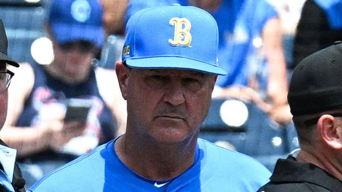  Jun 14, 2025; Omaha, Neb, USA; Murray State Racers head coach Dan Skirka and UCLA Bruins head coach John Savage meet with umpires before the game at Charles Schwab Field. Mandatory Credit: Steven Branscombe-Imagn Images | Steven Branscombe-Imagn Images 