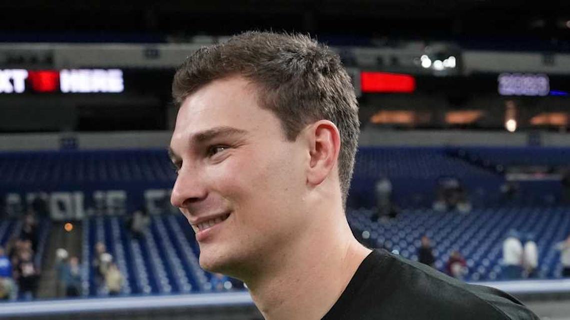  Feb 28, 2026; Indianapolis, IN, USA; Indiana quarterback Fernando Mendoza (QB11) looks on during the NFL Scouting Combine at Lucas Oil Stadium. Mandatory Credit: Kirby Lee-Imagn Images | Kirby Lee-Imagn Images 