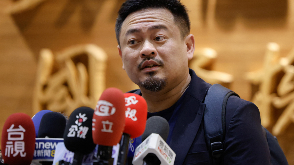 Taiwan minister says he was not 'belittled' on rare trip to China