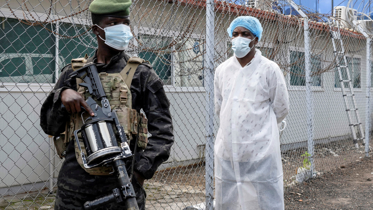 A member of the M23 rebel group stands guard as provincial authorities visit the Rodolphe Merieux Laboratory, National Biomedical Research Institute (INRB), where samples from suspected Ebola cases are tested, as part of the response to the epidemic in Goma, North Kivu province of the Democratic Republic of Congo, May 19, 2026. REUTERS/Arlette Bashizi/File Photo