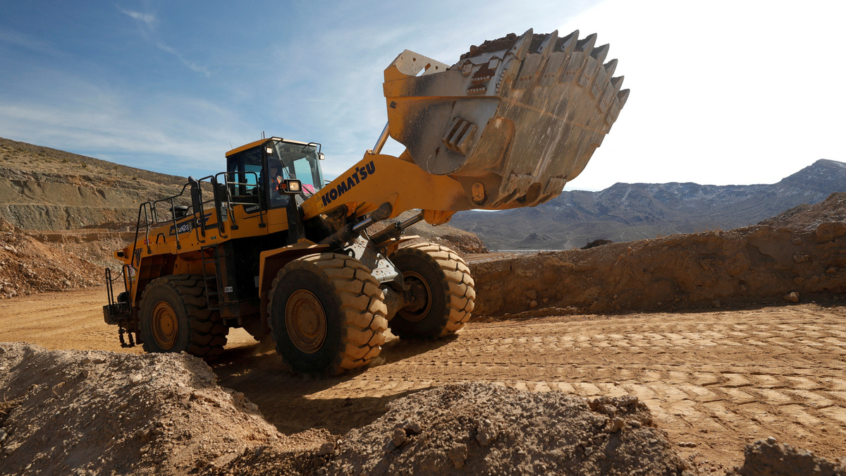 A wheel loader takes ore to a crusher at the MP Materials rare earth mine in Mountain Pass, California, U.S. January 30, 2020. Picture taken January 30, 2020. REUTERS/Steve Marcus