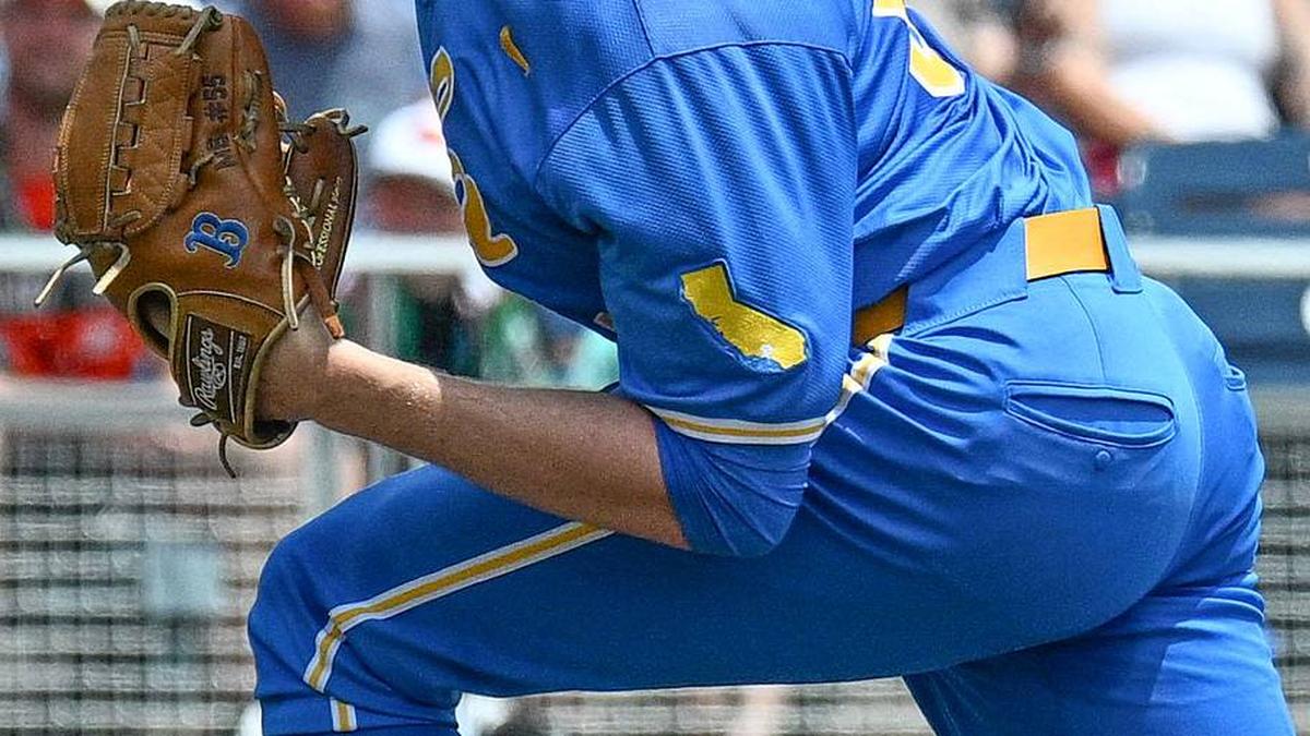  Jun 14, 2025; Omaha, Neb, USA; UCLA Bruins starting pitcher Michael Barnett (55) throws against the Murray State Racers during the first inning at Charles Schwab Field. Mandatory Credit: Steven Branscombe-Imagn Images | Steven Branscombe-Imagn Images 