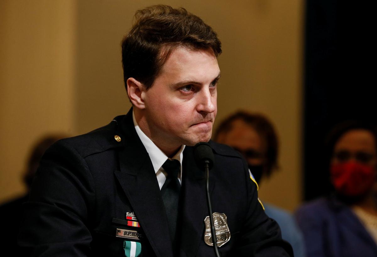 FILE PHOTO: Metropolitan Police Department Officer Daniel Hodges testifies during the opening hearing of the U.S. House (Select) Committee investigating the January 6 attack on the U.S. Capitol, on Capitol Hill in Washington, U.S., July 27, 2021. REUTERS/Jim Bourg/Pool/File Photo