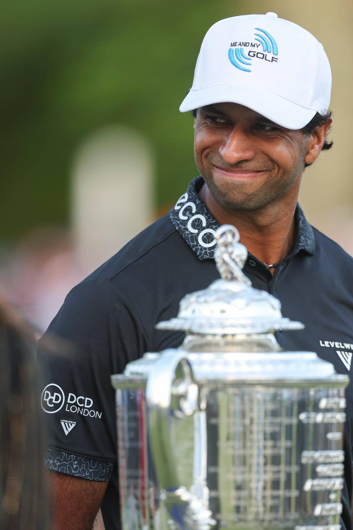  Aaron Rai is presented with the Wanamaker Trophy after winning the PGA Championship after the final round of the PGA Championship at Aronimink Golf Club on Sunday, May 17, 2026, in Newtown Square, Pennsylvania. (Photo by Maddie Meyer/PGA of America)