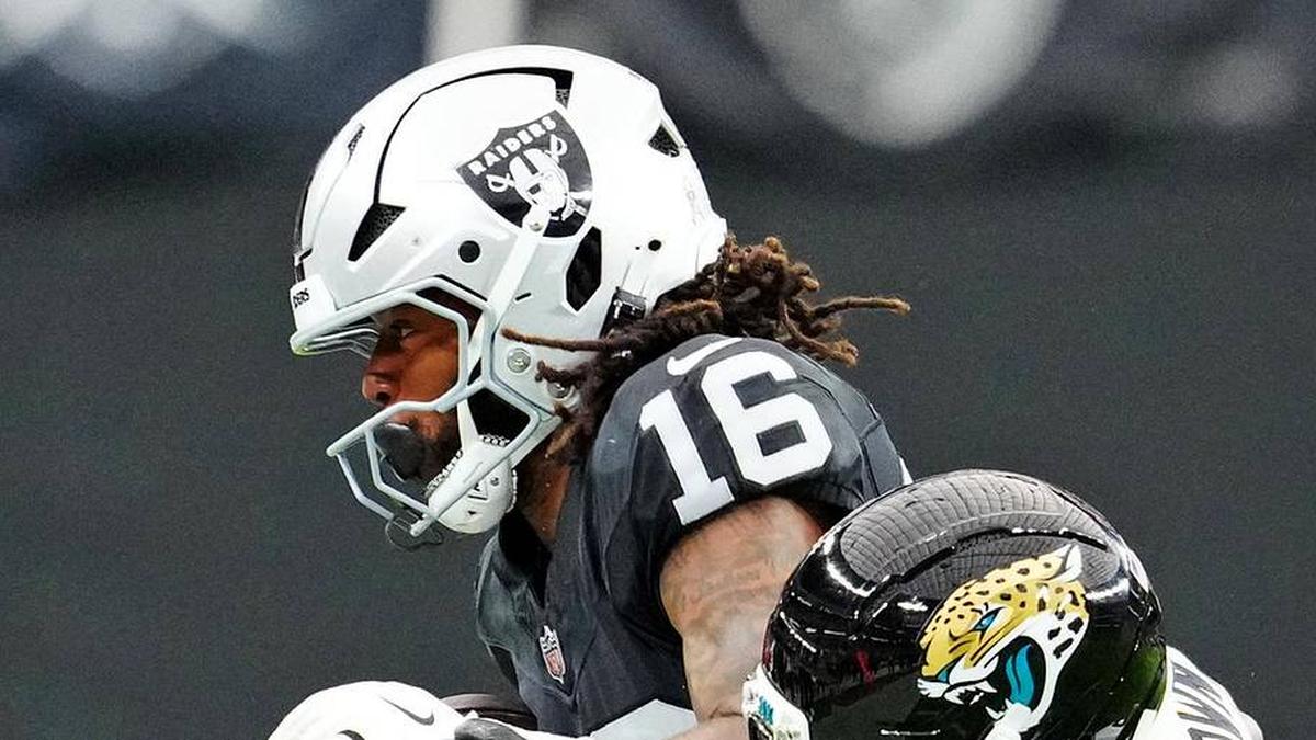  Nov 2, 2025; Paradise, Nevada, USA; Jacksonville Jaguars cornerback Montaric Brown (30) tackles Las Vegas Raiders wide receiver Jakobi Meyers (16) during the second half at Allegiant Stadium. Mandatory Credit: Stephen R. Sylvanie-Imagn Images | Stephen R. Sylvanie-Imagn Images 