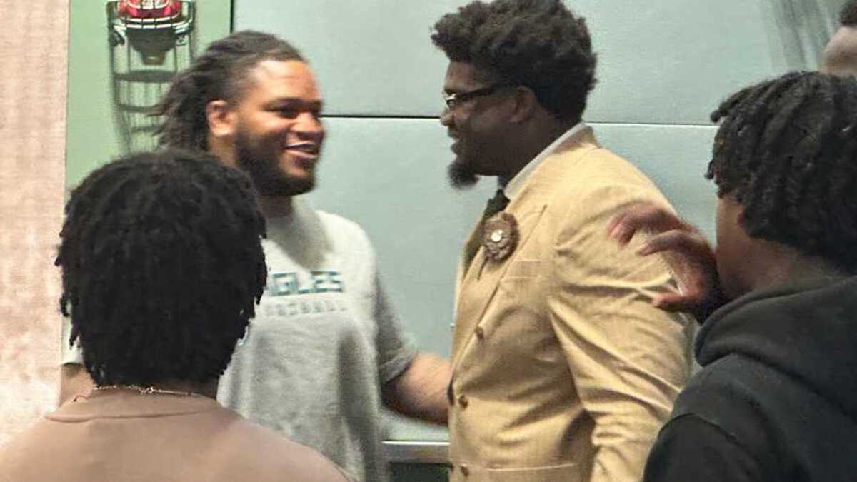  Jalen Carter (left) was on hand to hear Jordan Davis (right) talk to reporters about his contract extension that made the Eagles DT the highest-paid nose tackle in the NFL. | John McMullen/Eagles on SI 