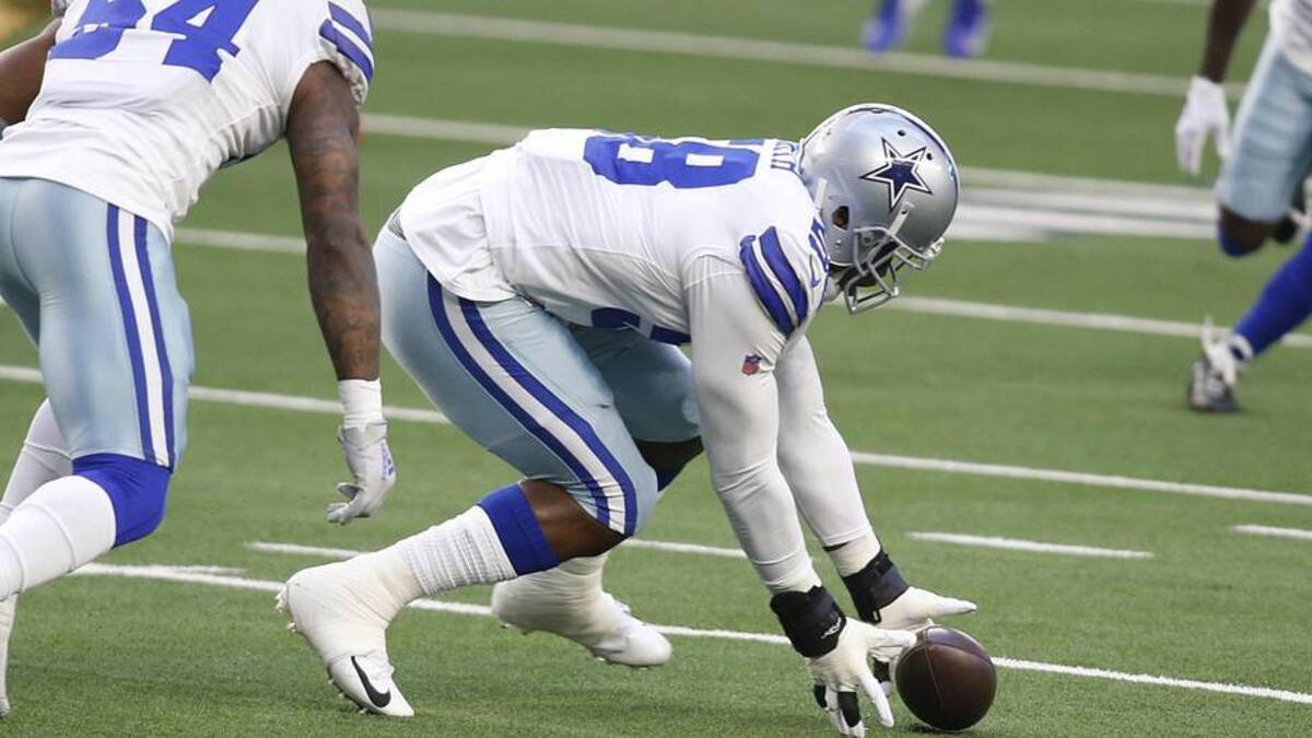  Dec 20, 2020; Arlington, Texas, USA; Dallas Cowboys defensive end Aldon Smith (58) picks up a fumble against the San Francisco 49ers in the first quarter at AT&T Stadium. Mandatory Credit: Tim Heitman-Imagn Images | Tim Heitman-Imagn Images 