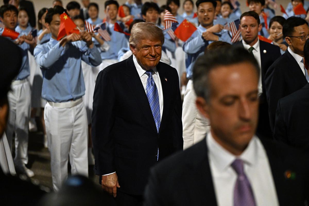 President Donald Trump arrives at Beijing Capital International Airport in Beijing, China, on Wednesday, May 13, 2026, for a two-day summit with China's leader, Xi Jinping. (Kenny Holston/The New York Times)