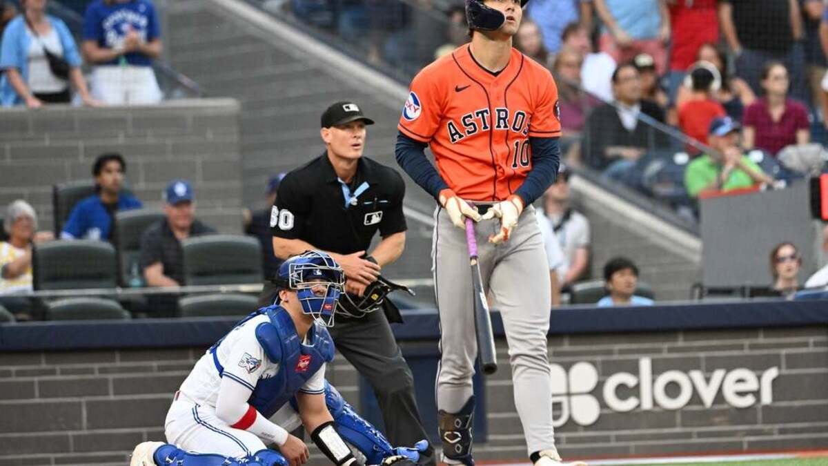 Houston Astros left fielder Joey Loperfido (10) watches the flight of the ball after hitting a three-run home run against the Toronto Blue Jays in the 11th inning Tuesday at Rogers Centre in Toronto.