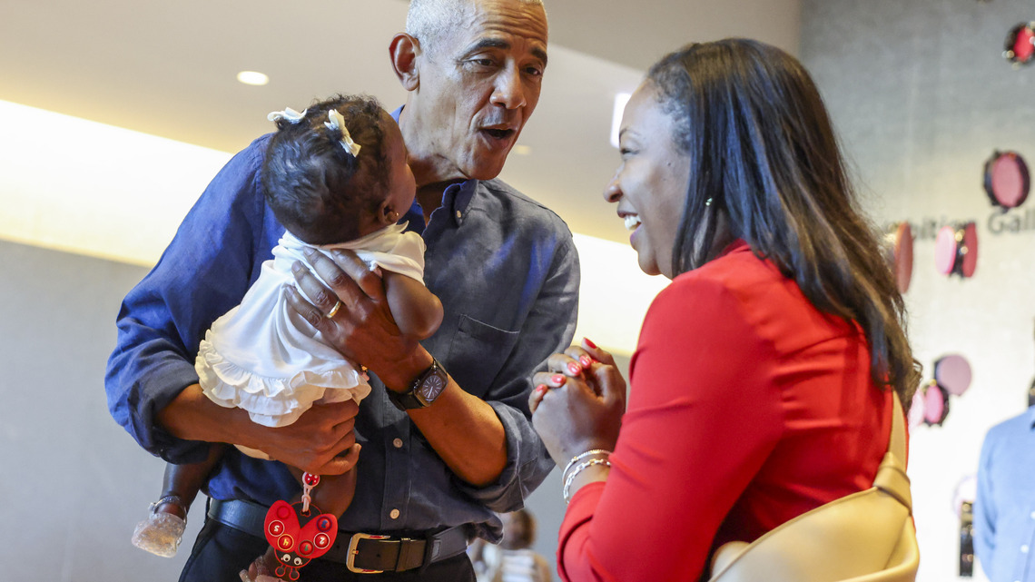 Lines and smiles as the Obama's welcome the public to presidential museum on Juneteenth 