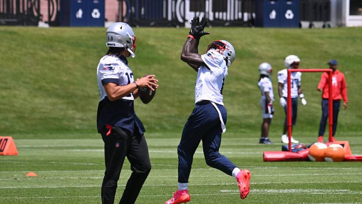  Jun 2, 2026; Foxborough, MA, USA; New England Patriots wide receiver A.J. Brown (1) makes a catch during the team's OTA at Gillette Stadium. Mandatory Credit: Eric Canha-Imagn Images | Eric Canha-Imagn Images 