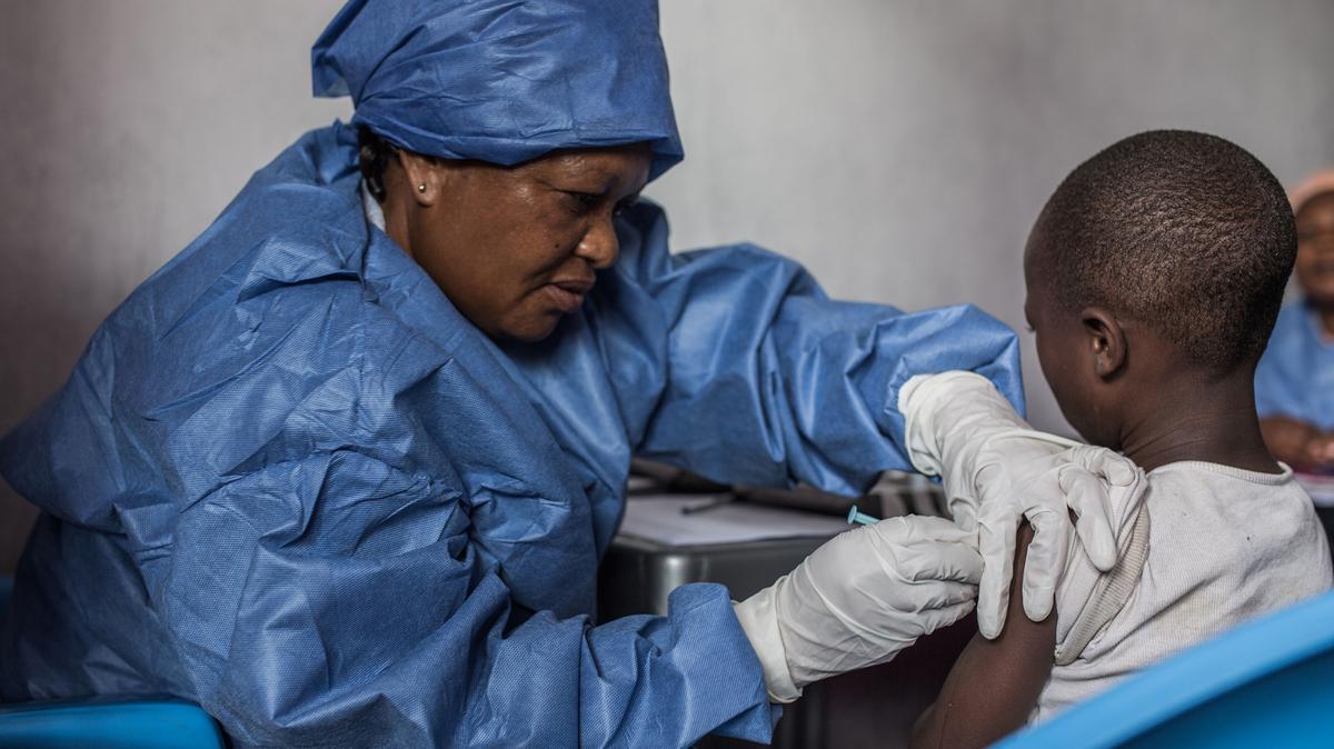A girl is inoculated with an Ebola vaccine on November 22, 2019, in Goma, Democratic Republic of the Congo. (Pamela Tulizo/AFP/Getty Images/TNS)