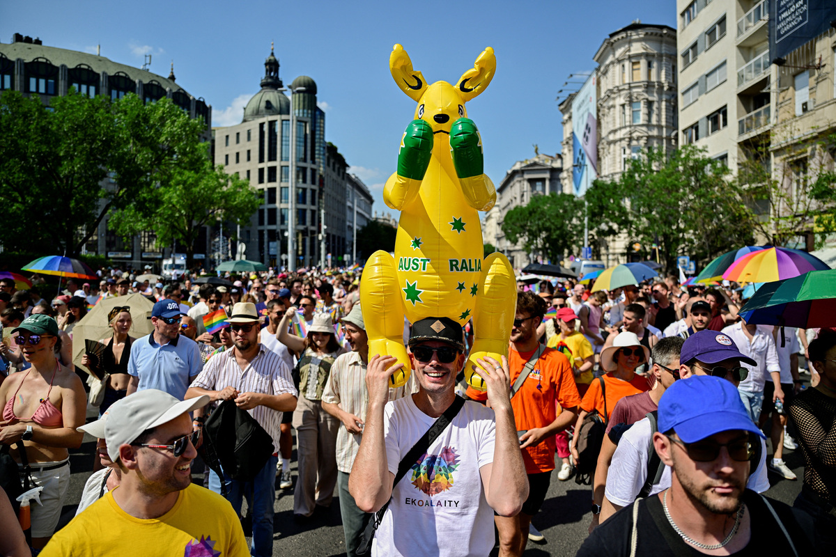 A man carries an inflatable kangaroo as people attend the Budapest Pride march in Budapest, Hungary, June 27, 2026. REUTERS/Marton Monus