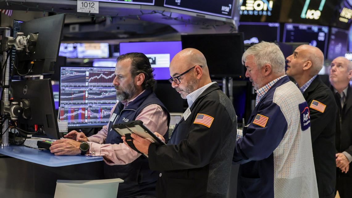 Wall Street indexes post closing record highs, AI rally pauses 
