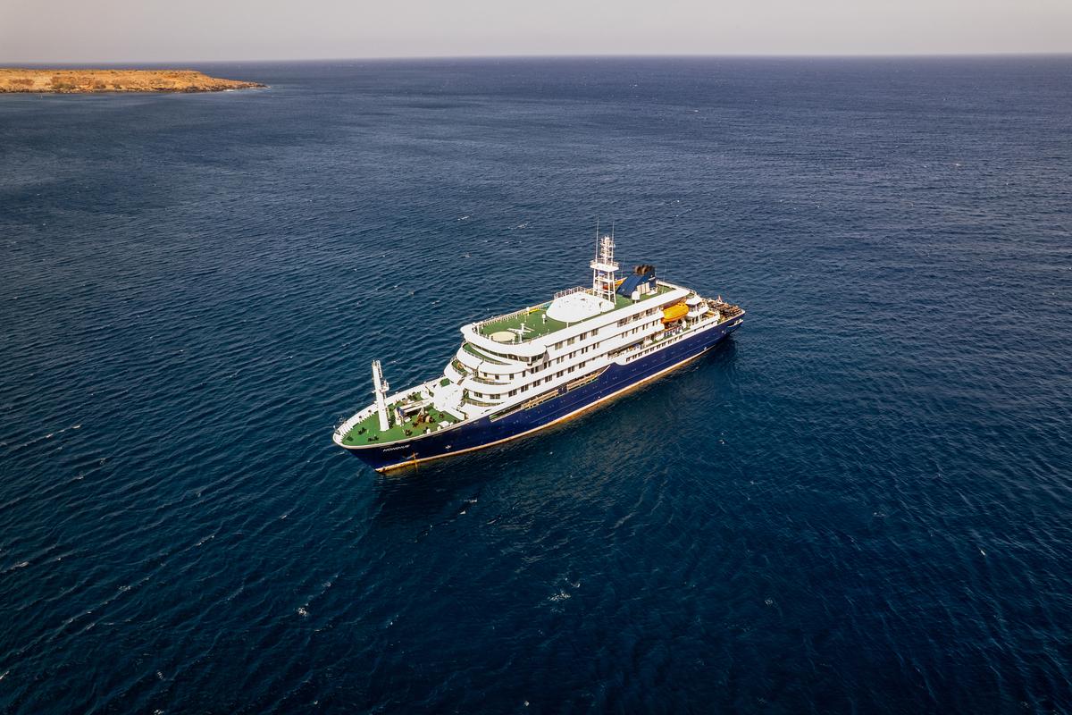  An aerial picture shows a general view of the cruise ship MV Hondius stationary off the port of Praia, the capital of Cape Verde, on May 3. (Photo by AFP via Getty Images) 