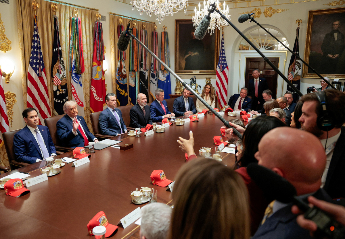 U.S. President Donald Trump gestures as him, Secretary of State Marco Rubio, Defense Secretary Pete Hegseth, Commerce Secretary Howard Lutnick, Transport Secretary Sean Duffy, Homeland Security Secretary Markwayne Mullin, Administrator of Small Business Administration Kelly Loeffler, U.S. Special Envoy Steve Witkoff and Trade Representative Jamieson Greer attend a cabinet meeting in the Cabinet Room at the White House, in Washington, D.C., U.S., May 27, 2026. REUTERS/Evan Vucci