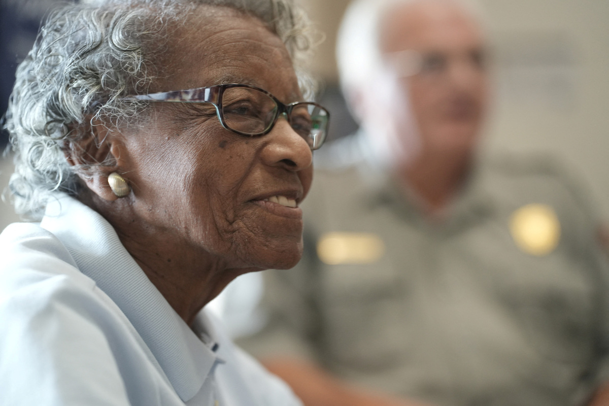Volunteer, Nell Draper-Winston greets visitors at the Maggie Walker National Historical Site in Richmond, Virginia, U.S., June 26, 2026.   REUTERS/Jay Paul