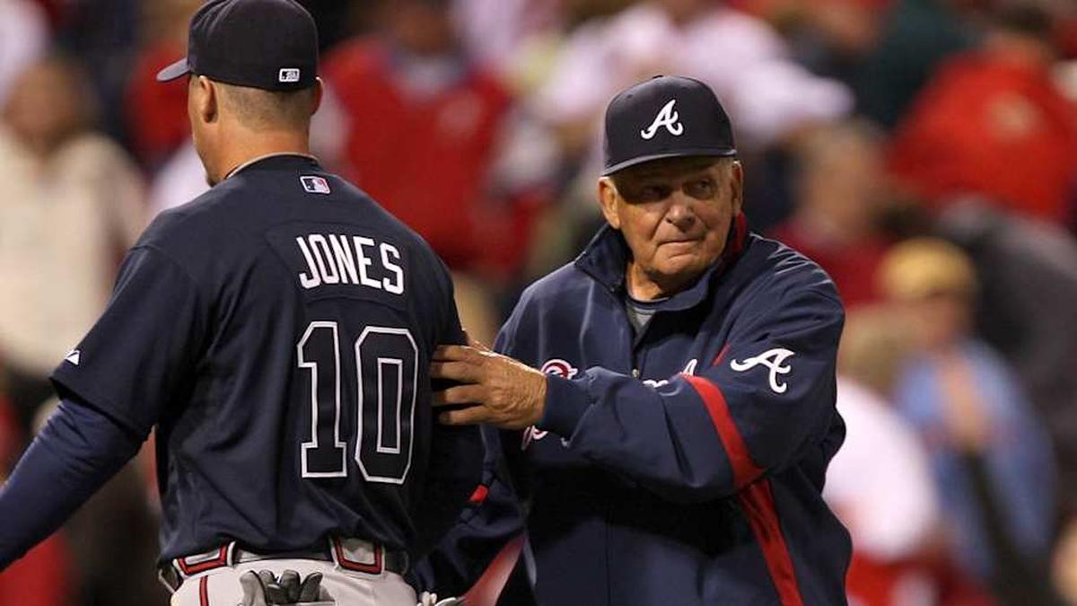  Bobby Cox, right, congratulates Chipper Jones after a Braves win. | Ezra Shaw/Getty Images 