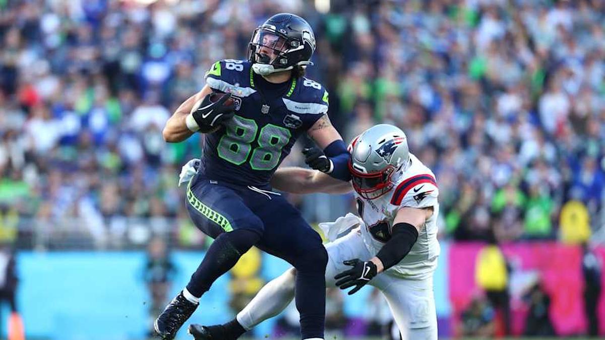  Feb 8, 2026; Santa Clara, CA, USA; Seattle Seahawks tight end AJ Barner (88) runs against New England Patriots linebacker Robert Spillane (14) during the first quarter in Super Bowl LX at Levi's Stadium. Mandatory Credit: Mark J. Rebilas-Imagn Images | Mark J. Rebilas-Imagn Images 