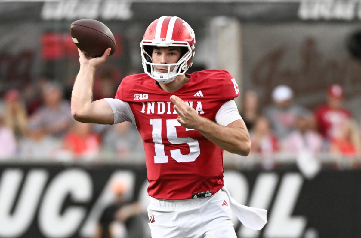Oct 18, 2025; Bloomington, Indiana, USA; Indiana Hoosiers quarterback Fernando Mendoza (15) throws a pass during the first half against the Michigan State Spartans at Memorial Stadium. © Robert Goddin-Imagn Images
