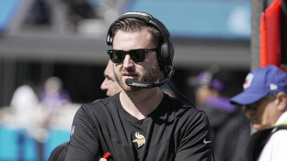  (EDITORS NOTE: caption correction) Oct 17, 2021; Charlotte, North Carolina, USA; Minnesota Vikings quarterbacks coach Andrew Janocko on the sidelines during the first quarter against the Carolina Panthers at Bank of America Stadium. Mandatory Credit: Jim Dedmon-Imagn Images | Jim Dedmon-Imagn Images 