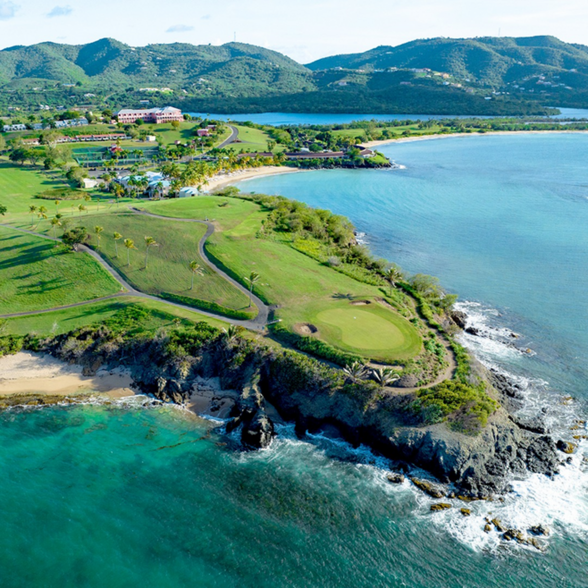 Beach vibes or epic golf views? You don't have to choose at this breathtaking St. Croix resort. Photo credit: Buccaneer Resort St. Croix