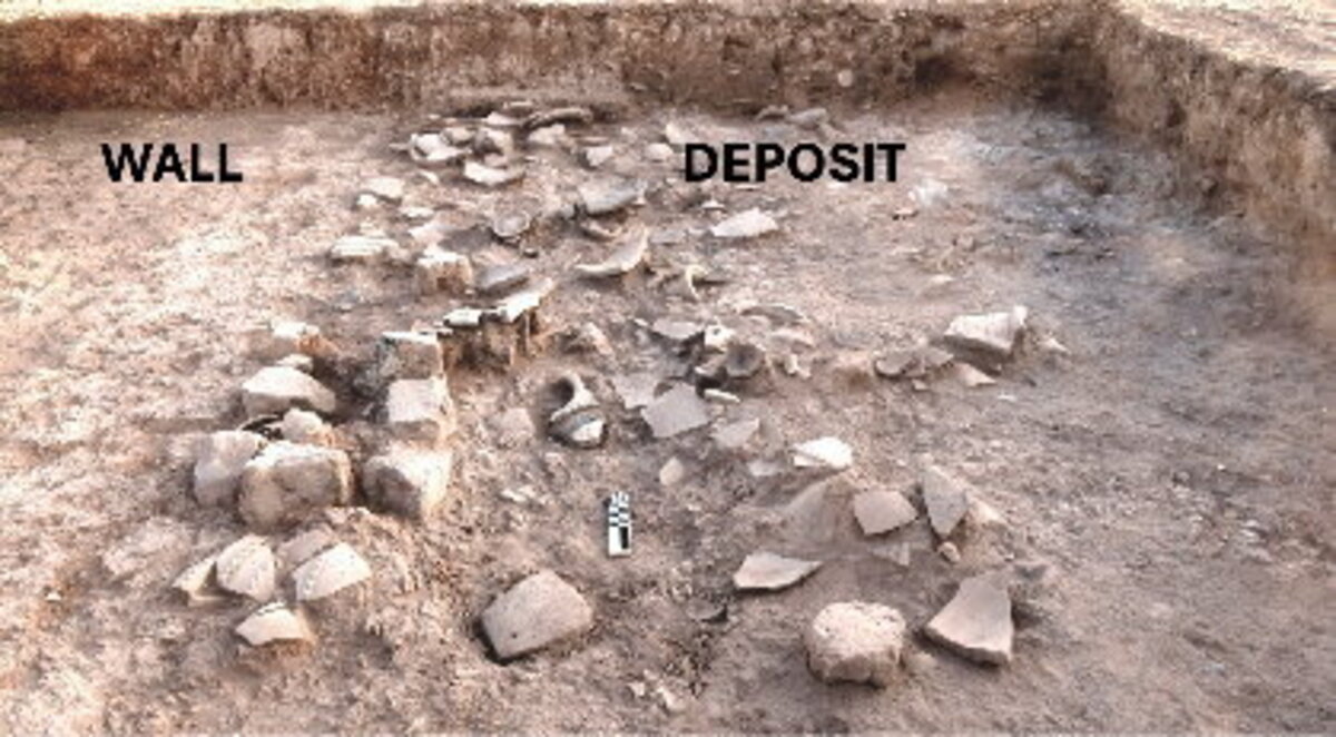  Broken vessels and other debris from a destruction layer were preserved east of a monumental mudbrick wall in the Lower Town East Palace at Kurd Qaburstan. (Edward Dandrow / Kurd Qaburstan Project via SWNS) 