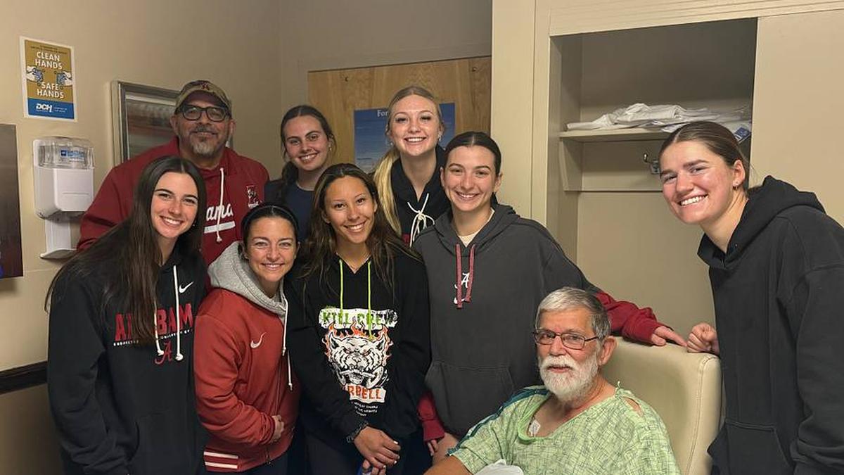  Members of the Alabama softball family (head coach Patrick Murphy, assistant coach Ryan Iamurri, players Lauren Johnson, Alea Johnson, Salen Hawkins, Abby Duchscherer, Mari Hubbard and Jena Young) visit George Harris in the hospital | George Harris 