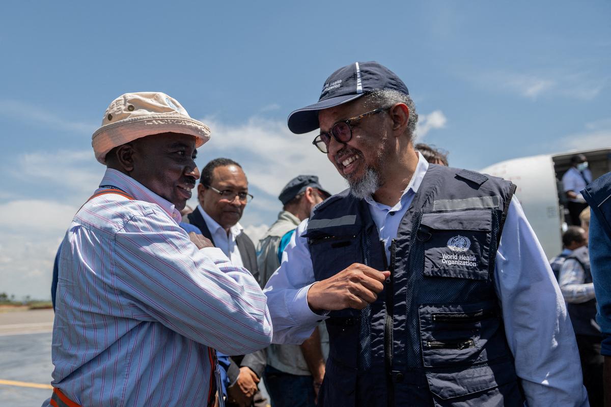 Director-General of the World Health Organisation (WHO) Tedros Adhanom Ghebreyesus is received as he arrives at Bunia National Airport, to coordinate the response to the Ebola outbreak, as agencies intensify efforts to contain a new Ebola outbreak caused by the Bundibugyo virus strain, in Bunia, Ituri province, Democratic Republic of Congo, May 30, 2026. REUTERS/Stringer