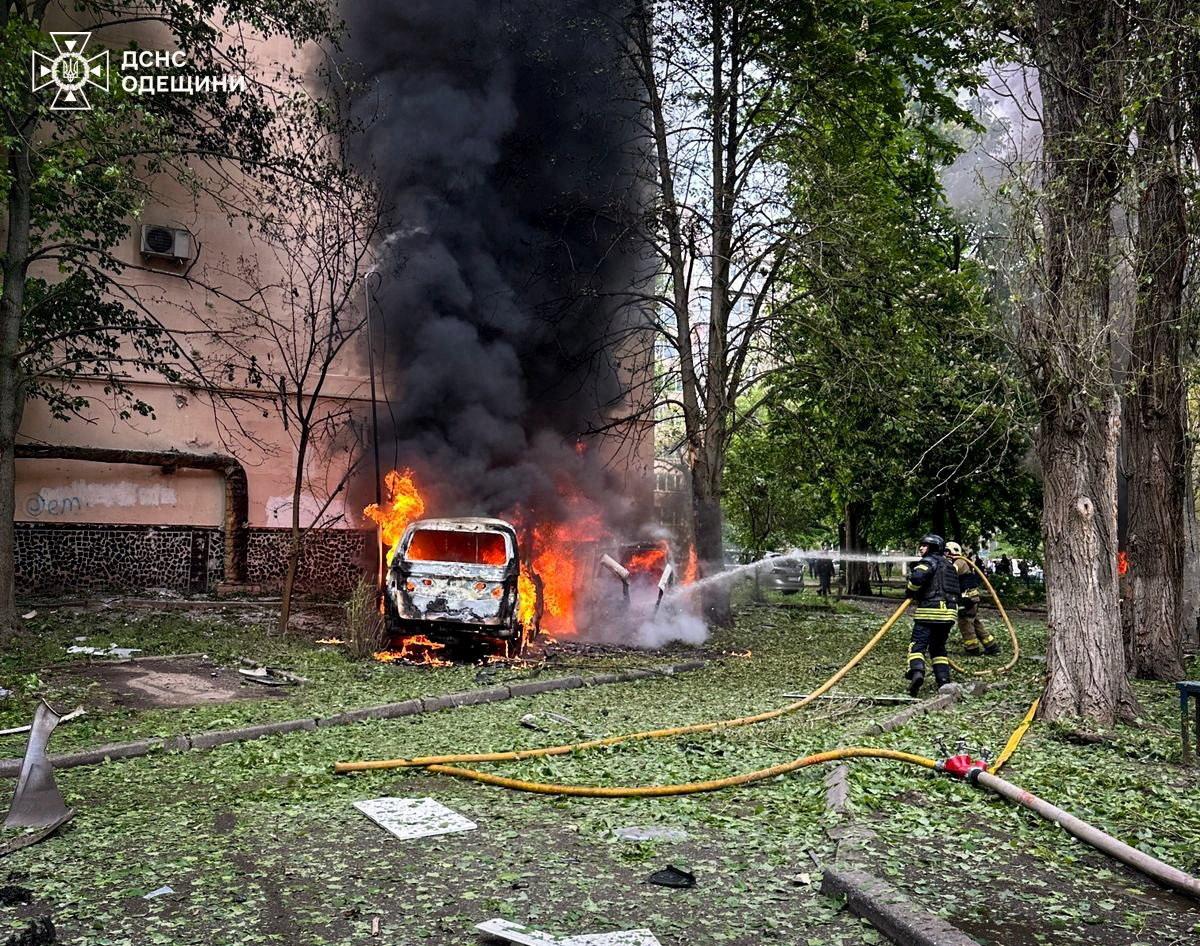 Firefighters extinguish burning cars which were damaged during a Russian drone strike, amid Russia's attack on Ukraine, in Odesa, Ukraine, May 13, 2026. Press service of the State Emergency Service of Ukraine in Odesa region/Handout via REUTERS