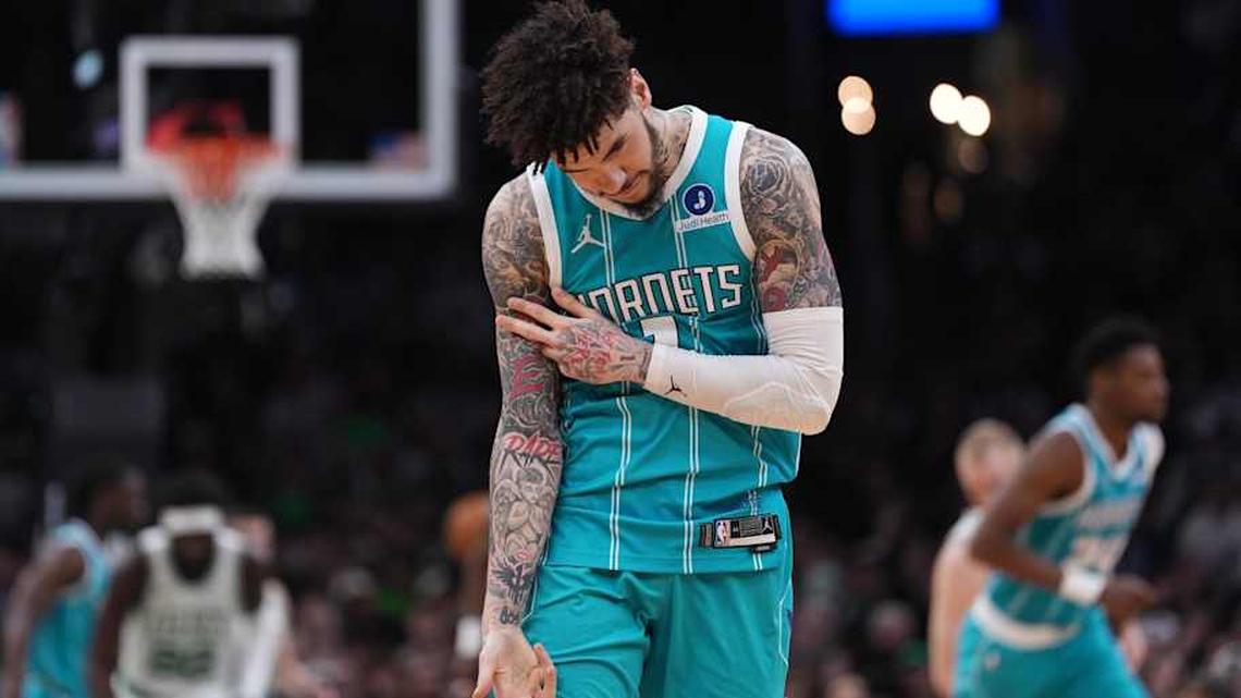  Charlotte Hornets guard LaMelo Ball reacts after his three point basket against the Boston Celtics. | David Butler II-Imagn Images 