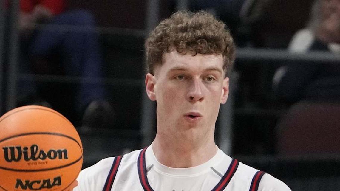  March 9, 2026; Las Vegas, NV, USA; Saint Mary's Gaels center Andrew McKeever (45) passes the basketball against Santa Clara Broncos center Bukky Oboye (12) during the first half at Orleans Arena. Mandatory Credit: Kyle Terada-Imagn Images | Kyle Terada-Imagn Images 