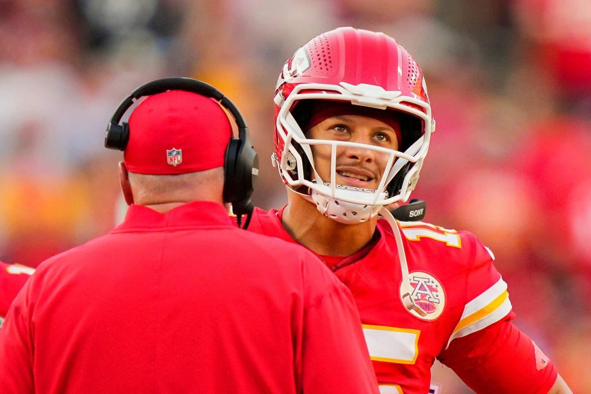  Sep 28, 2025; Kansas City, Missouri, USA; Kansas City Chiefs quarterback Patrick Mahomes (15) talks with head coach Andy Reid during the second half against the Baltimore Ravens at GEHA Field at Arrowhead Stadium. Mandatory Credit: Jay Biggerstaff-Imagn Images 