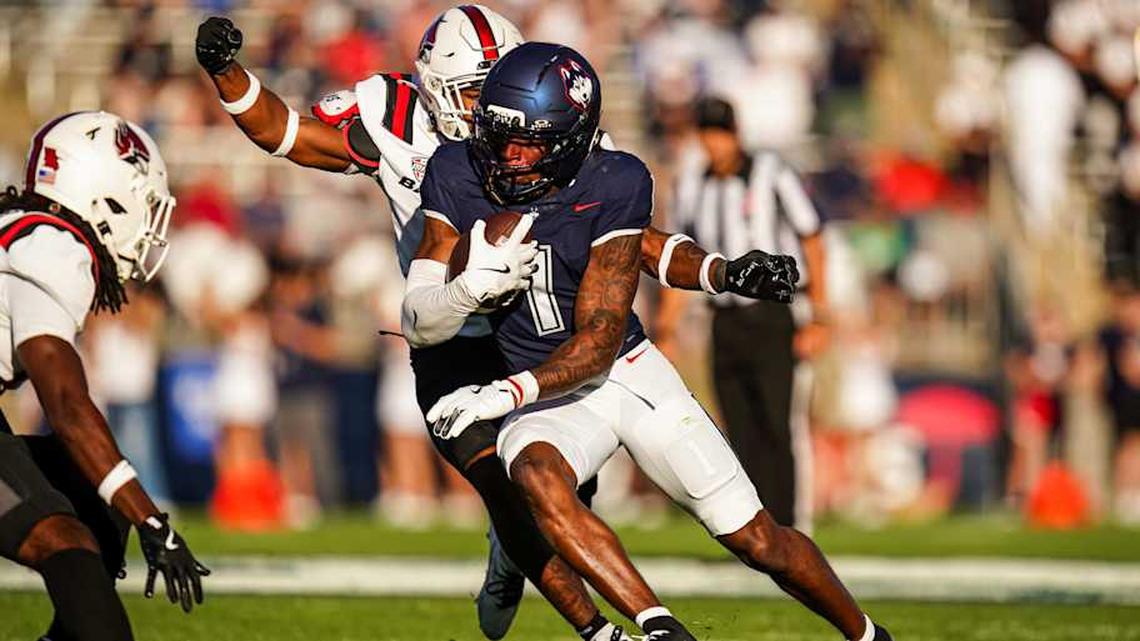  Sep 20, 2025; East Hartford, Connecticut, USA; Connecticut Huskies wide receiver Skyler Bell (1) runs the ball against the Ball State Cardinals in the second half at Pratt & Whitney Stadium at Rentschler Field. Mandatory Credit: David Butler II-Imagn Images | David Butler II-Imagn Images 