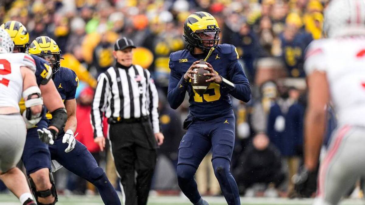  Michigan quarterback Bryce Underwood (19) looks to pass against Ohio State during the first half at Michigan Stadium in Ann Arbor on Saturday, Nov. 29, 2025. | USA TODAY Network via Reuters Connect 