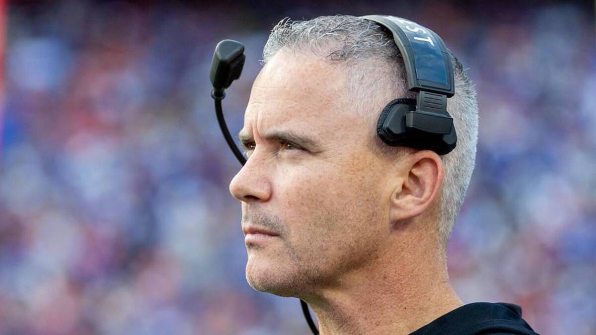 Nov 29, 2025; Gainesville, Florida, USA; Florida State Seminoles head coach Mike Norvell walks the sidelines during the first quarter against the Florida Gators at Ben Hill Griffin Stadium. Mandatory Credit: Bob Kupbens-Imagn Images. 