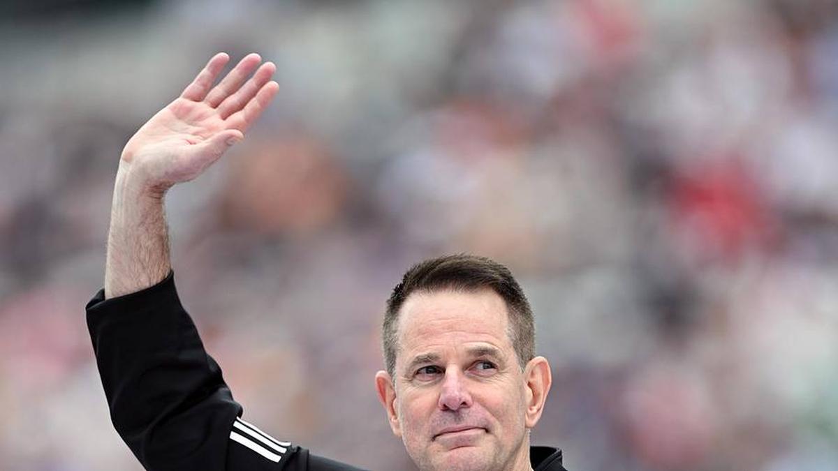  May 24, 2026; Indianapolis, Indiana, USA; Indiana Hoosiers football head coach Curt Cignetti waves before the 110th Running of the Indianapolis 500 at Indianapolis Motor Speedway. Mandatory Credit: Marc Lebryk-Imagn Images | Marc Lebryk-Imagn Images 