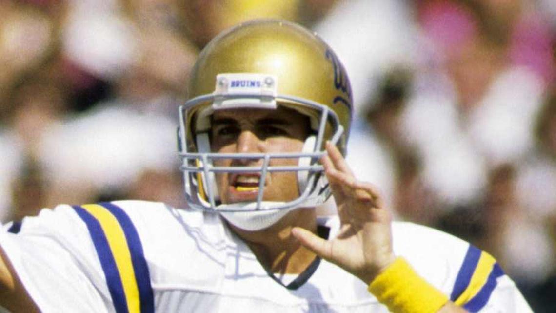  Sep 22, 1990; Ann Arbor, MI, USA; FILE PHOTO; UCLA Bruins quarterback Tommy Maddox (8) throwing the ball against the Michigan Wolverines at Michigan Stadium. Mandatory Credit: Imagn Images | RVR Photos-Imagn Images 
