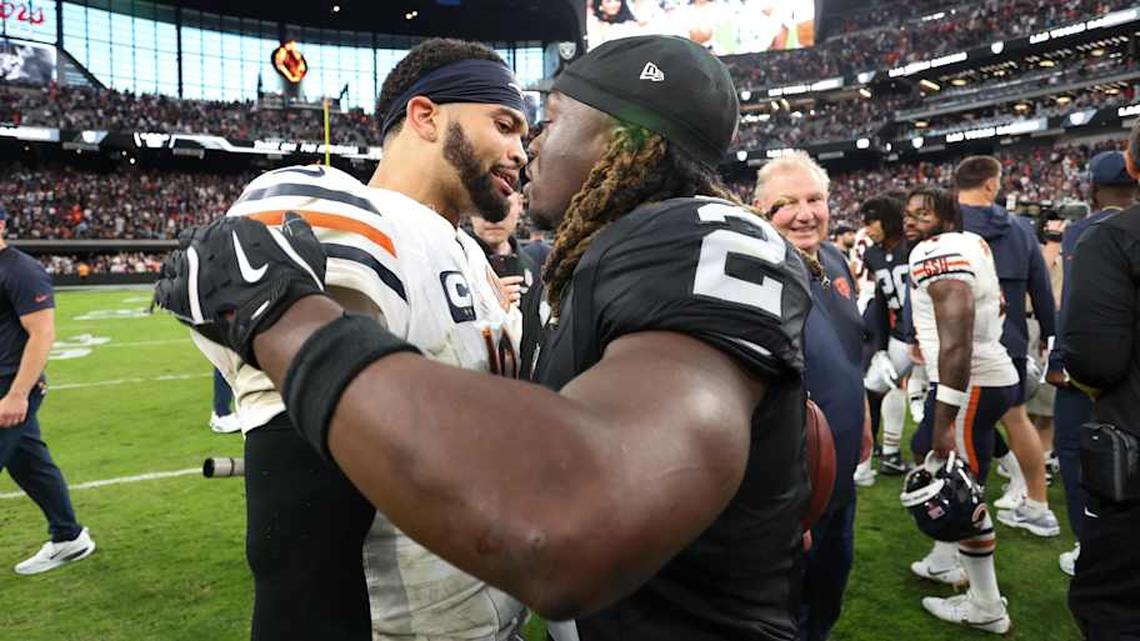 Sep 28, 2025; Paradise, Nevada, USA; Las Vegas Raiders running back Ashton Jeanty (2) hugs Chicago Bears quarterback Caleb Williams (18) after the game at Allegiant Stadium. Mandatory Credit: Kiyoshi Mio-Imagn Images | Kiyoshi Mio-Imagn Images 