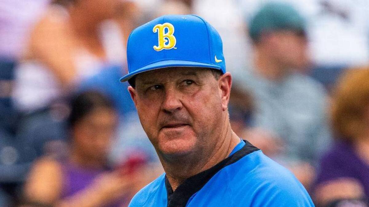  Jun 16, 2025; Omaha, Neb, USA; UCLA Bruins head coach John Savage walks off the field before the game against the LSU Tigers at Charles Schwab Field. Mandatory Credit: Dylan Widger-Imagn Images | Dylan Widger-Imagn Images 